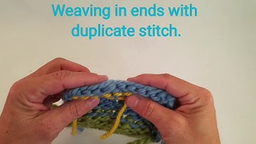 Weaving ends in knitting using duplicate stitch.