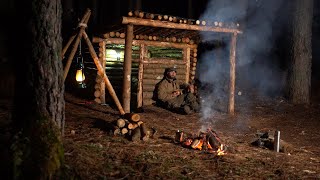 I built a canopy on my hunter shelter.survival in the wilderness. cook liver on open fire.Overnight