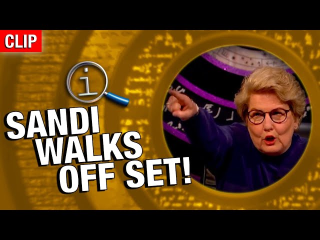QI | Sandi Walks Off Set! class=