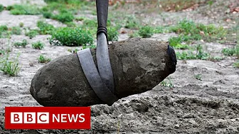 Unexploded WWII bomb revealed in drought-hit Italian river - BBC News