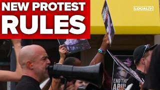 City deal sets protest limits outside downtown Kroger amid small business complaints
