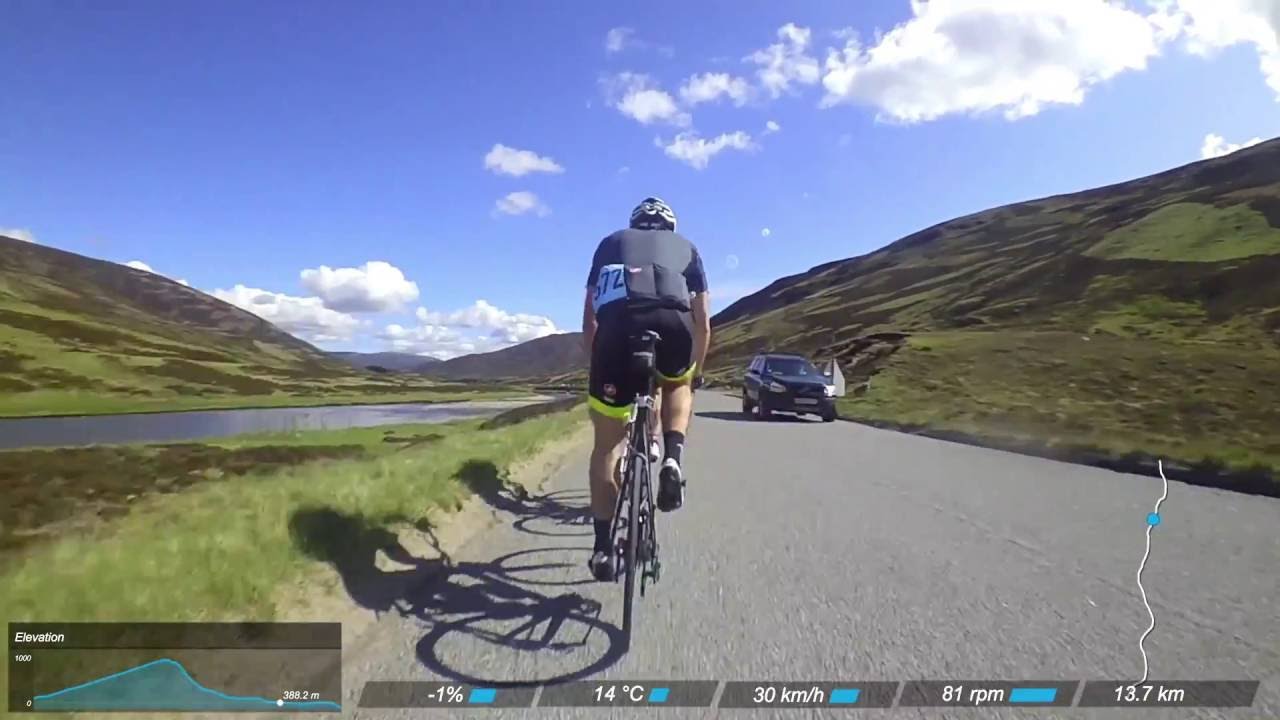 Road bike climbs Glenshee, Cairngorms (in the sun) Tour of the