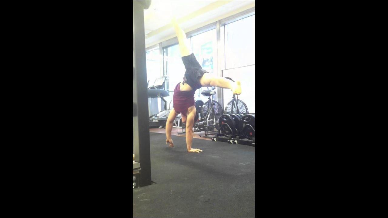 One arm handstand pushup negative to elbow lever YouTube