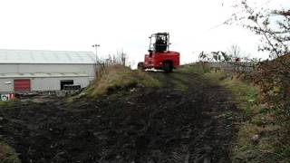 Moffett truckmounted forklift demonstrating its amazing offroad capabilities!