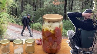 Outdoor quick lunch in the forest .. Cooking meat in glass jar