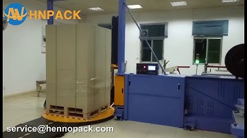 Hennopack pallet stretch wrapper integrated with pallet strapping machine system