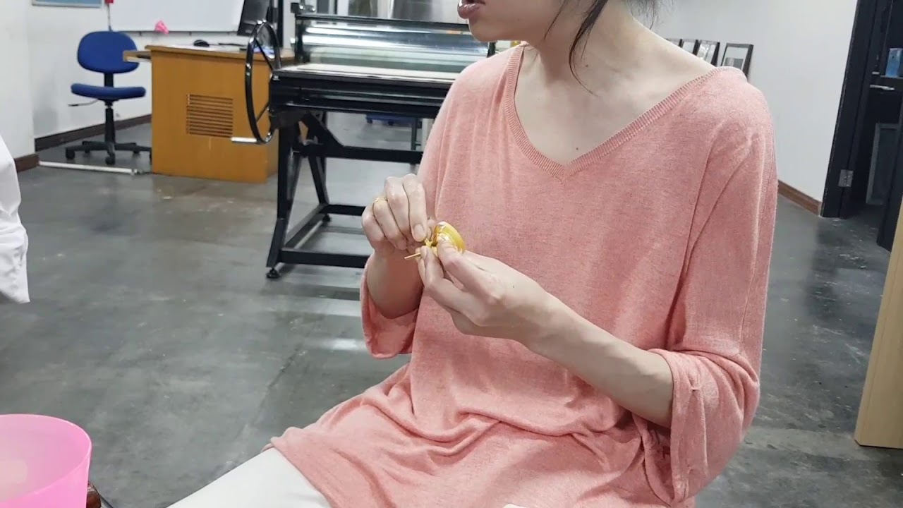 Tying knot on damp bamboo