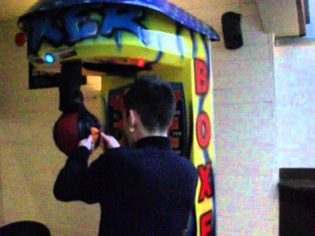 Chris and Sam head butting punch bag machine