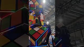 Faiqriya climbing huge rubix cube