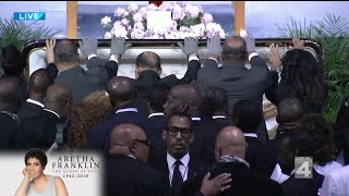 Family lowers Aretha Franklin's casket at Greater Grace Temple