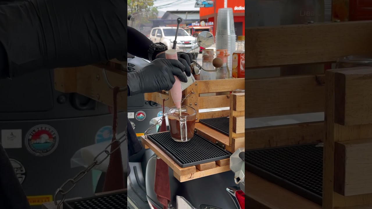 Vespa sprint coffee bar by young barista start small business open roadside shop on wheels scooter