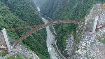 Bridge with largest arch span in China completes connection