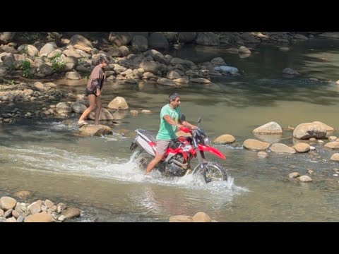 Erika almost fell in and didn't have the courage to cross the river because it has a lot of loose...