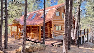 Starview Lodge- Flagstaff vacation rental. 4/2 Log cabin style and huge deck with pine views.