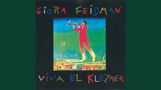 Download Lagu Rozhinkes mit Mandlen MP3