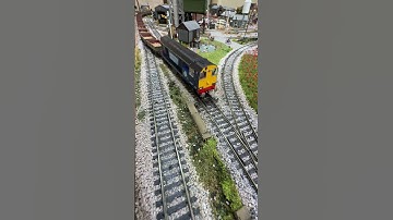 20309 pulling ore over a Peco streamlined points crossover.