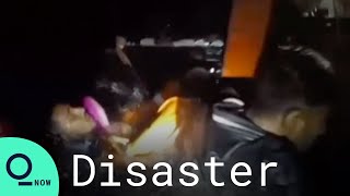 30+ Migrants Rescued From Capsized Boat Off Italy's Lampedusa Island screenshot 2