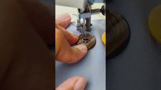Sewing button using a semi portable sewing machine #sewing