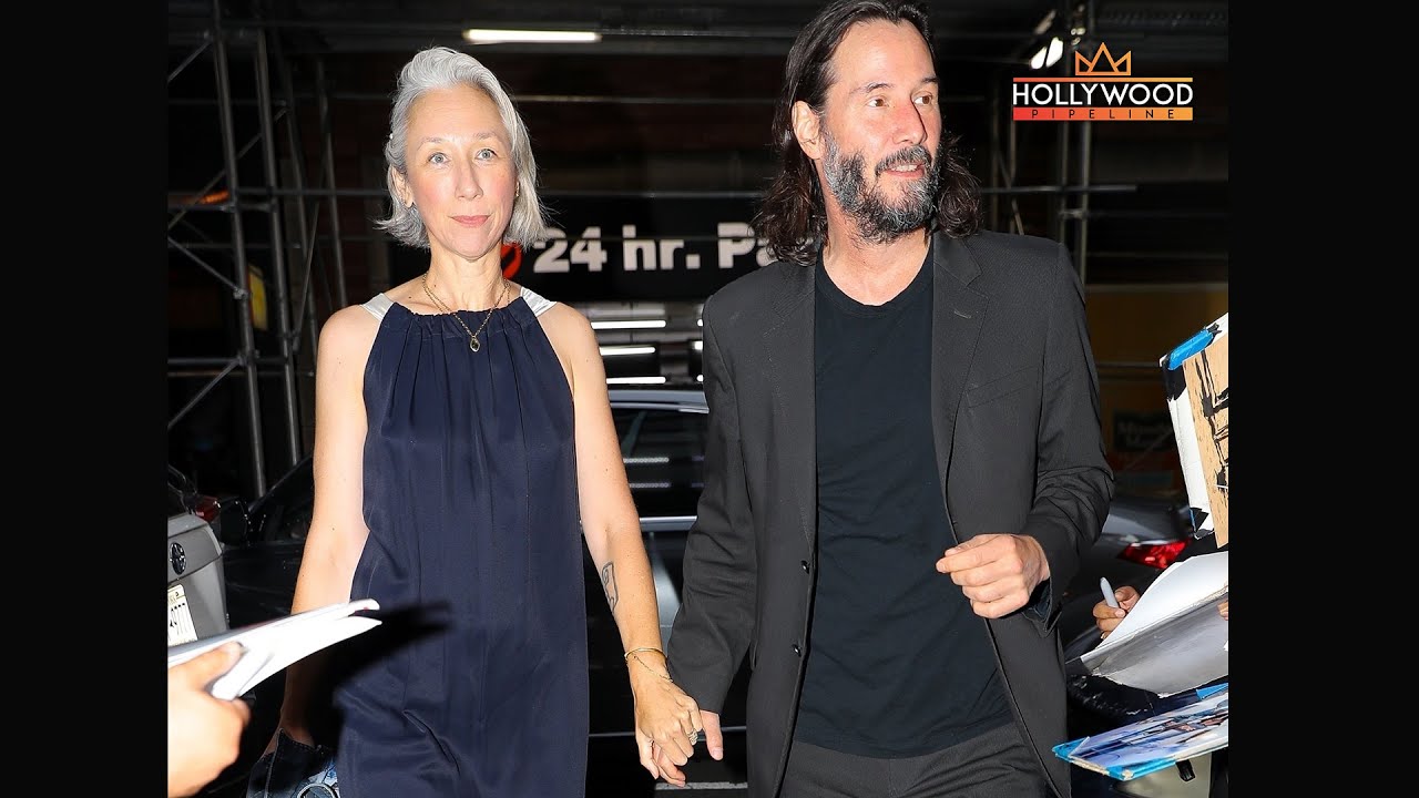 Keanu Reeves with Alexandra Grant wearing Diamond Ring on THAT finger