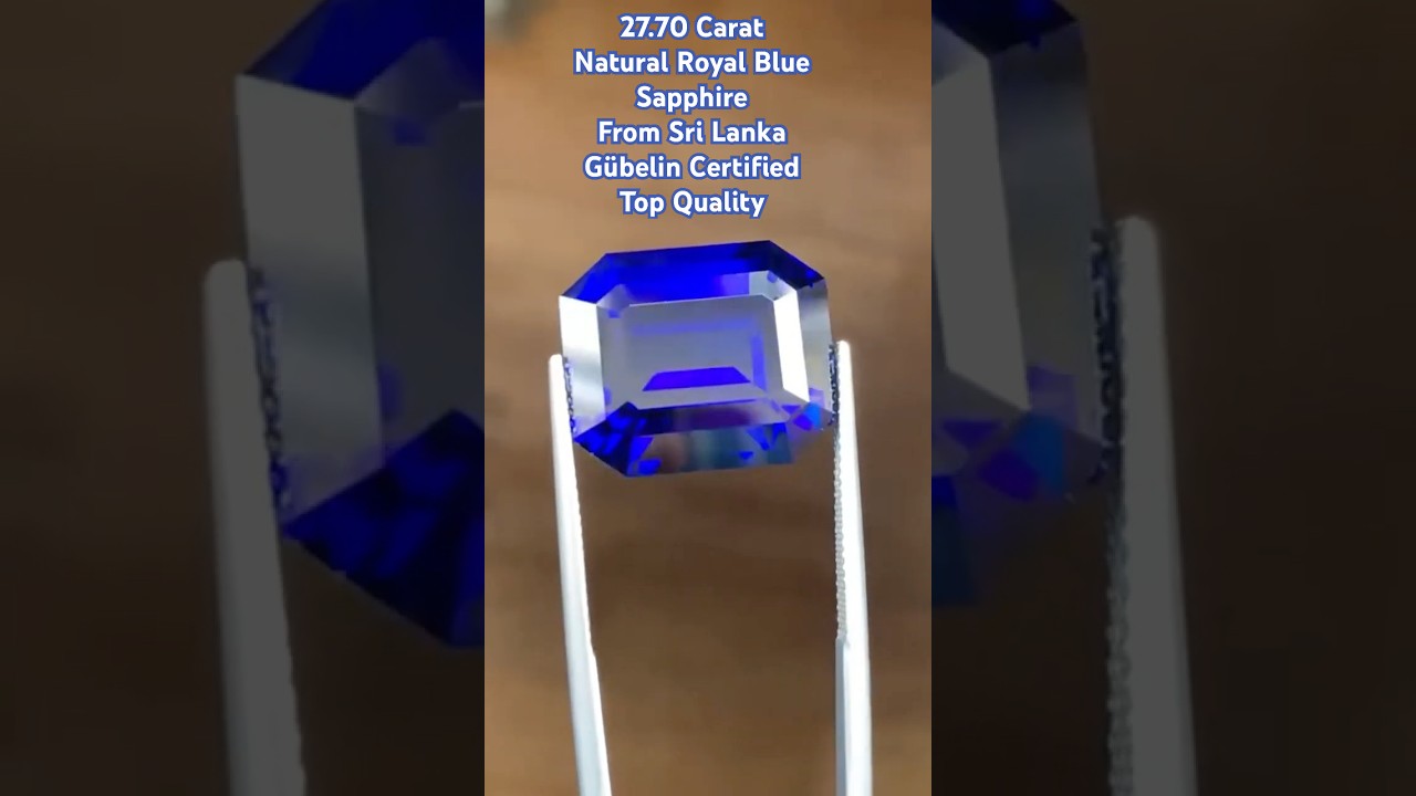 27.70 carat. Natural Royal Blue Sapphire. Emerald Cut. Gubelin Certificate.  
