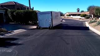 A Box Moving and Storage Loading a 8x20 portable container