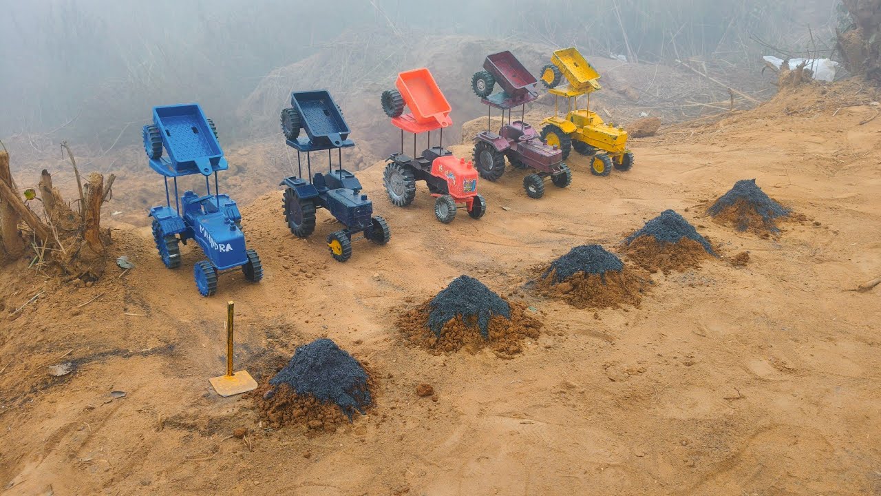 The tractor carried two types of soil.