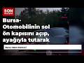 Bursa- Otomobilinin sol ön kapısını açıp, ayağıyla tutarak trafikte ilerledi
