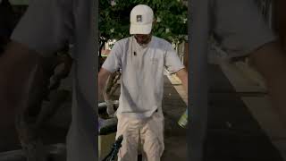 Man Startled by Crawling Cockroach on His Shirt