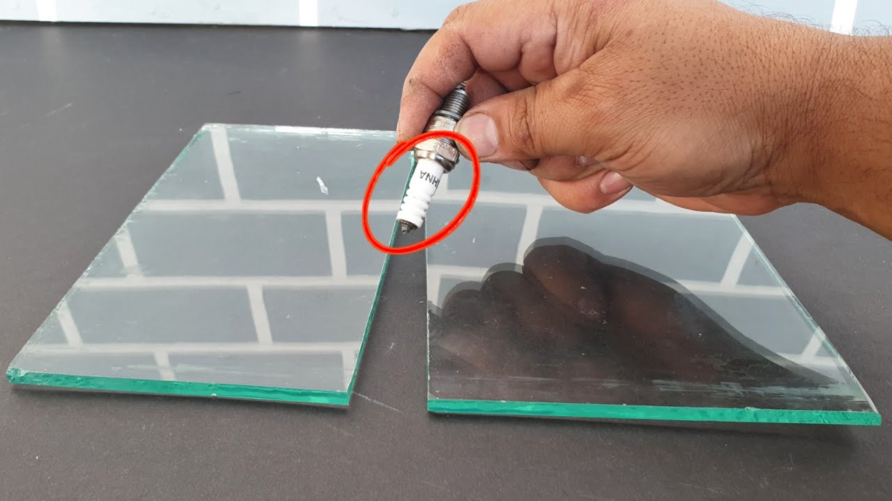 Cut glass safely and efficiently using spark plug. a creative alternative.