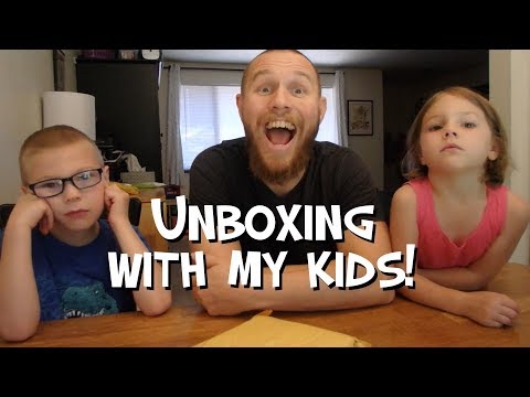 Unboxing new stamps with my kids! - Mr. Riedl