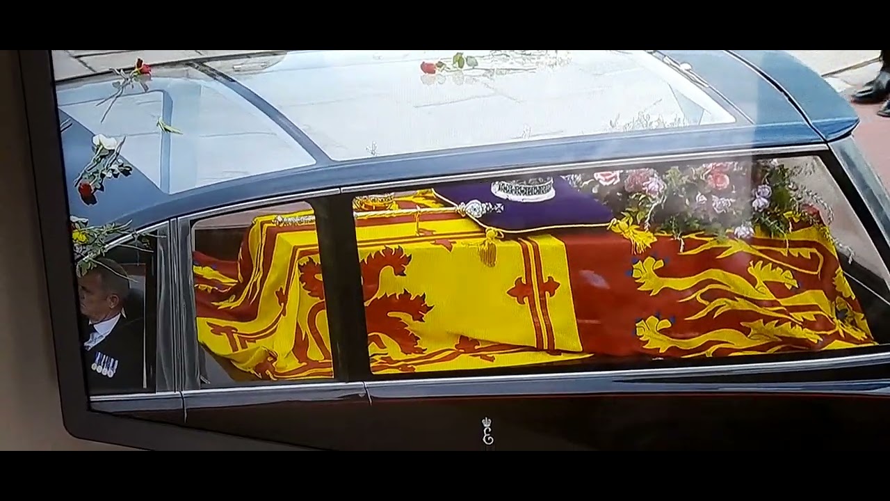 The Queen arrives St Chapel Windsor to Bagpipes 'Flowers of