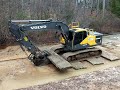 Excavator Venturing Out Onto Quicksand