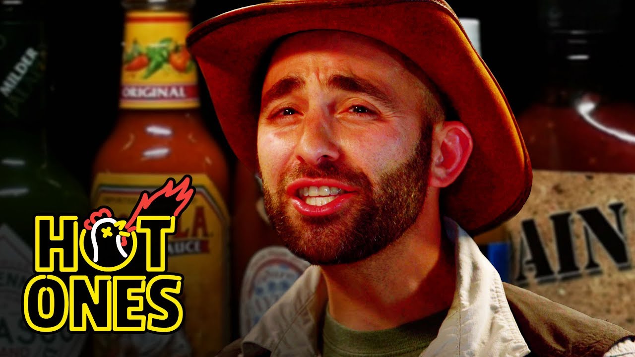 Coyote Peterson Gets STUNG by Spicy Wings | Hot Ones | First We Feast