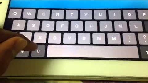 iOS 8 beta 3 on iPad 2 with a Dictation Button