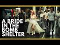 Bride in a bomb shelter: Tel Aviv woman dons wedding dress to seek love amid war