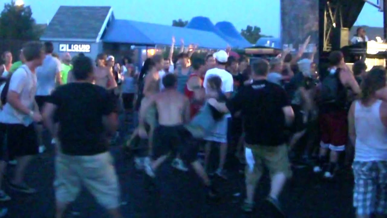 Watch Warped tour- DUDE GETS LAID OUT IN MOSH PIT!!! on YouTube Watch Warped tour- DUDE GETS LAID OUT IN MOSH PIT!!! on YouTube