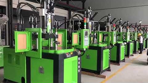 Rotary table vertical injection molding machine