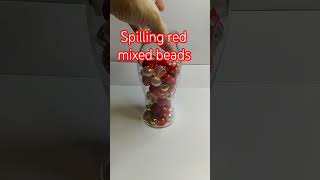 Spilling red mixed beads #shortvideo