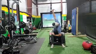 Seated banded windmill for thoracic spine mobility