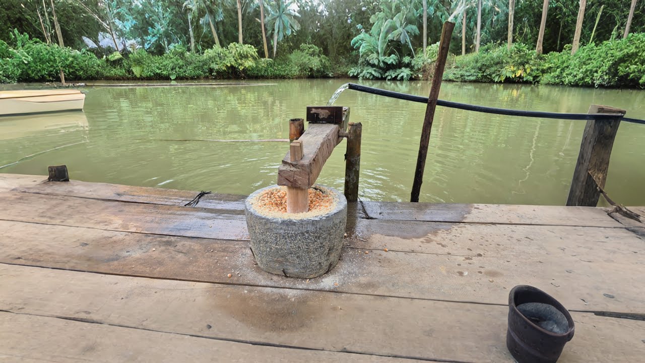 Simple water-powered corn mill p 211