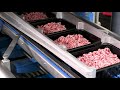 Sealpac a7 traysealer for beef mince with portion to pack and denester  food industry automation