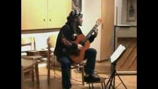Tobias Karlsson playing a concert with acoustic guitars