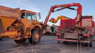 Changing a tyre on a Volvo A20C Articulated Dump Truck