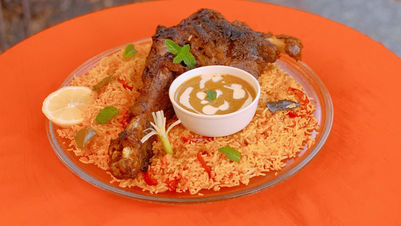 Mutton Raan Rice Mutton Raan platter..bahot hi laziz…(Goat raan with saffron rice and ...