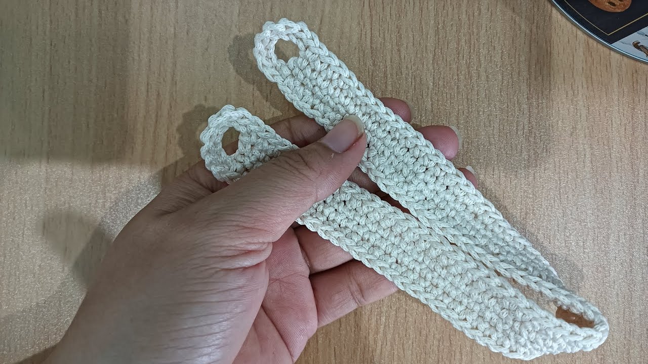 Móc quai túi bình nước gài nút 