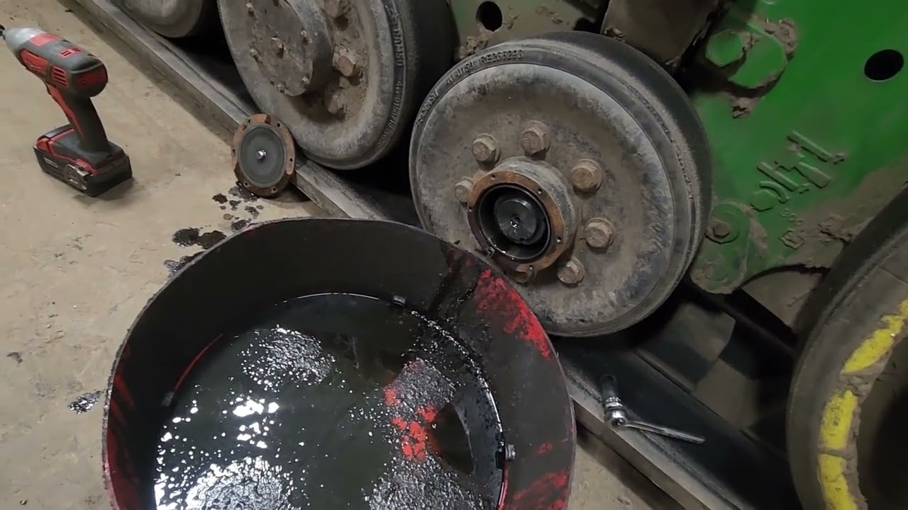 John deere track machine bogie wheel fluid.         