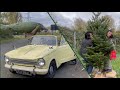 GIANT Christmas Tree In Small Convertible Drives Through London