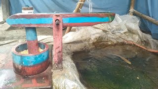 water powered pounder corn live