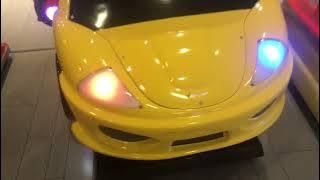 Feng yung cheng yellow amazing sports car kiddie ride. (Game Option.) (Mute.)