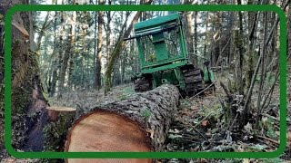 John Deere 420 Crawler/ Skidding a nice log off the Mountain